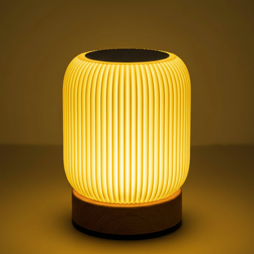 Dimmable portable table lamp showing adjustable brightness levels in a warm ambient setting