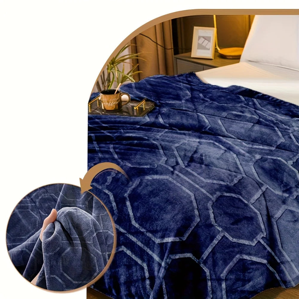 Blue textured blanket on a bed with text highlighting its features.