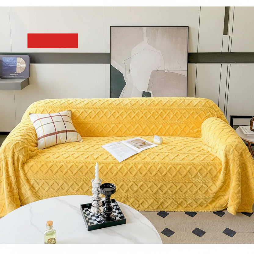 Yellow sofa cover on a couch with a minimalistic background