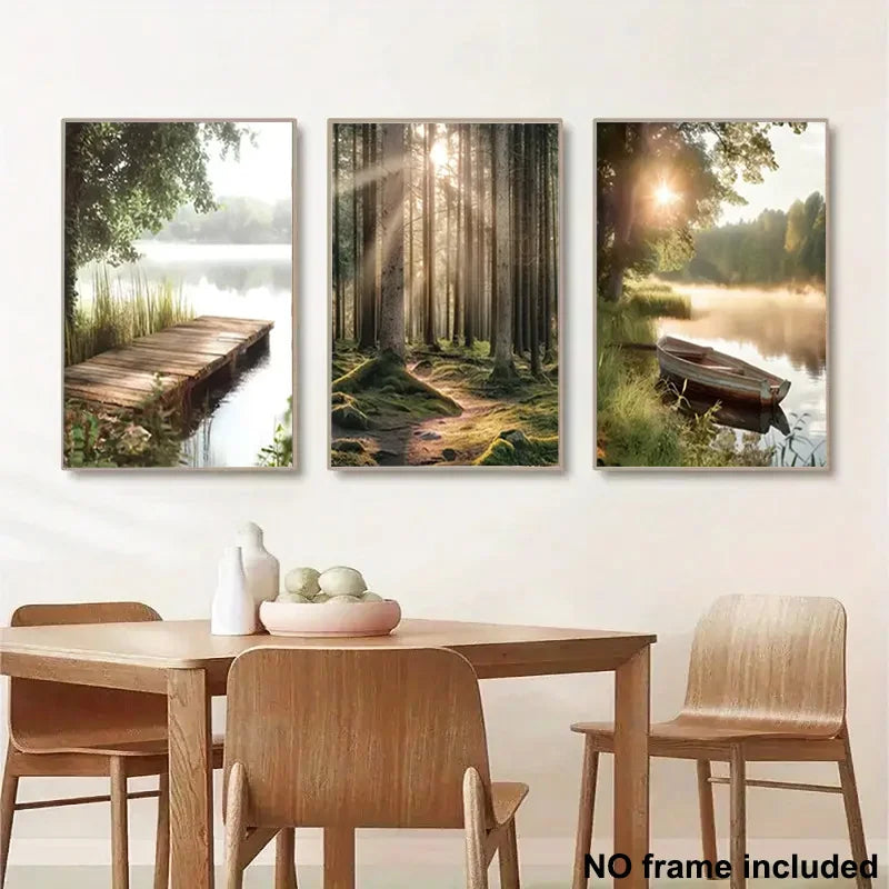 Three landscape paintings of nature scenes above a dining table with chairs.