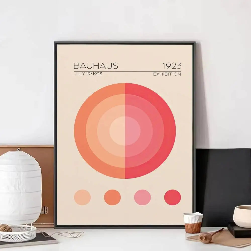 Bauhaus exhibition-style print with layered circular shapes in soft peach, pink, and coral tones.
