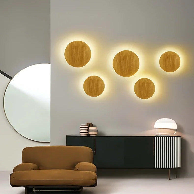 Creative wooden LED wall lights above a sideboard in a modern living room.