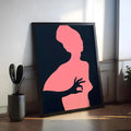 Pink silhouette of a woman's torso against a dark navy background canvas print.