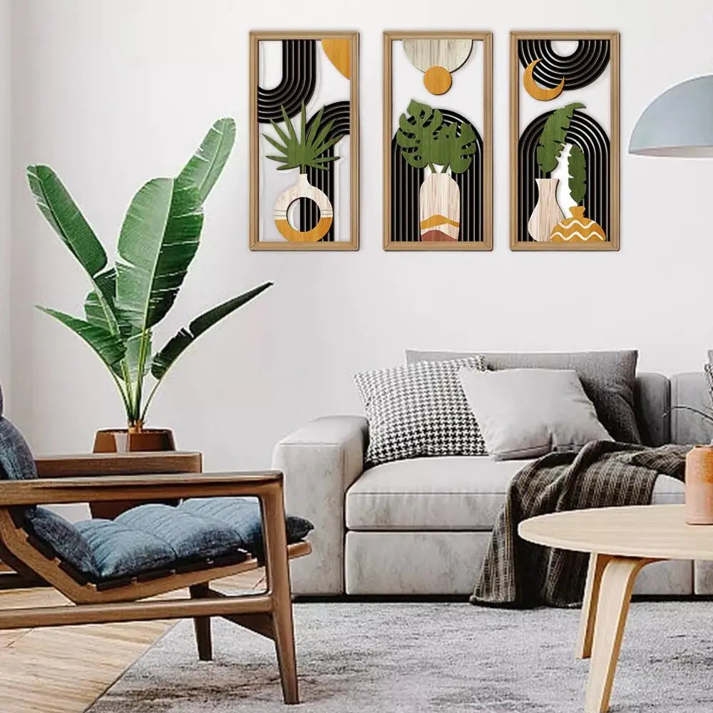 Modern living room with a grey sofa, wooden armchair, and decorative wall art.