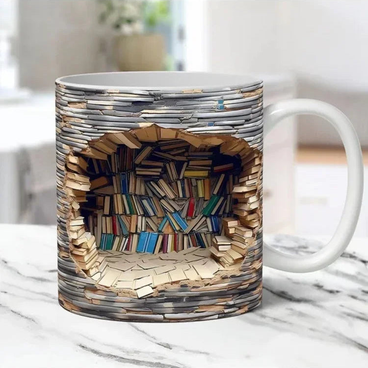 Mug with a design of books stacked inside, on a marble surface.