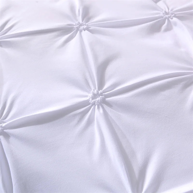 Close-up of white textured fabric with a pleated pattern
