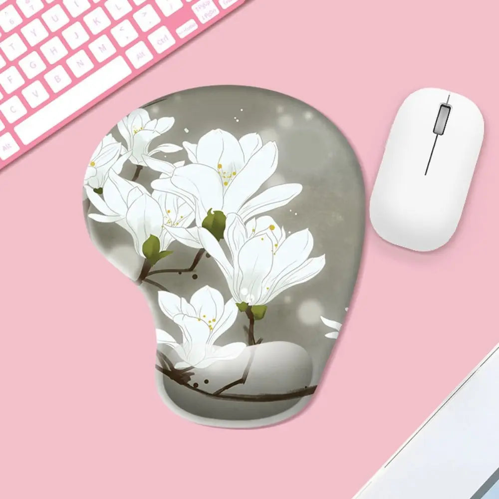Floral mouse pad with a white mouse on a pink surface