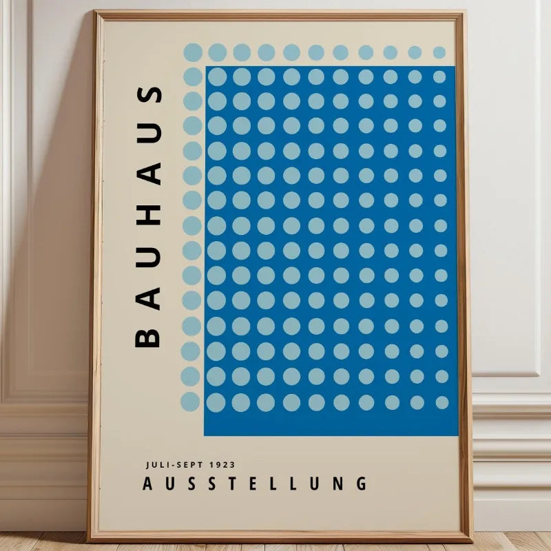 Bauhaus dot pattern canvas print with blue circular grid and minimalist typography