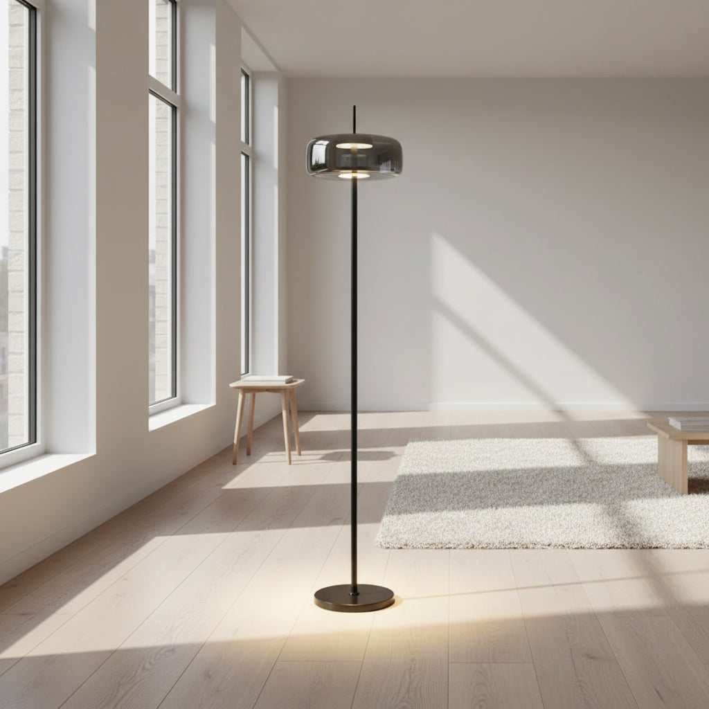 Black minimalist floor lamp with illuminated smoked glass shade