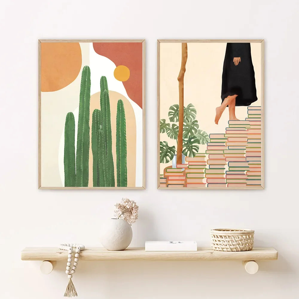 Two framed artworks on a wall above a shelf with decorative items.