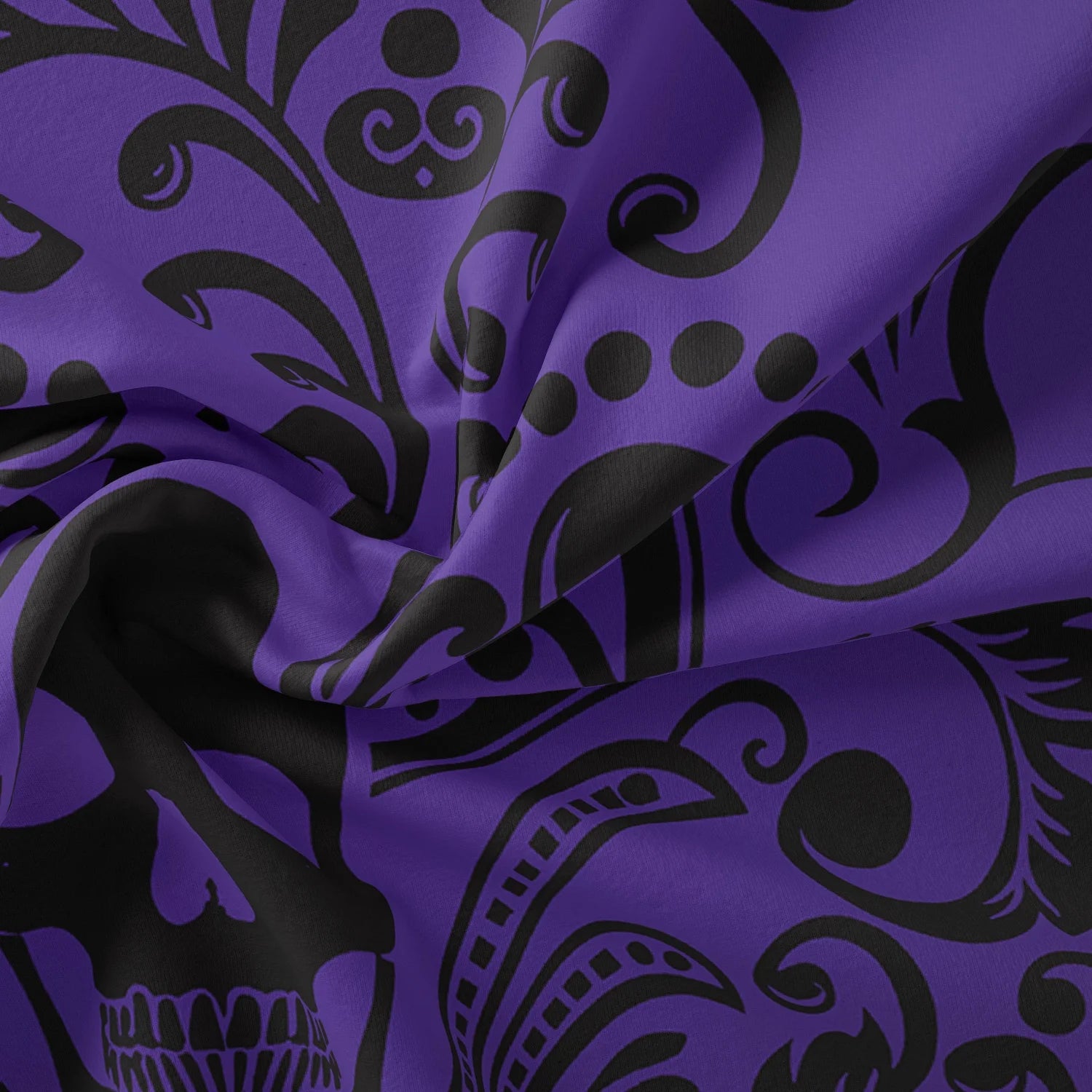 Violet purple skull print duvet cover close-up.