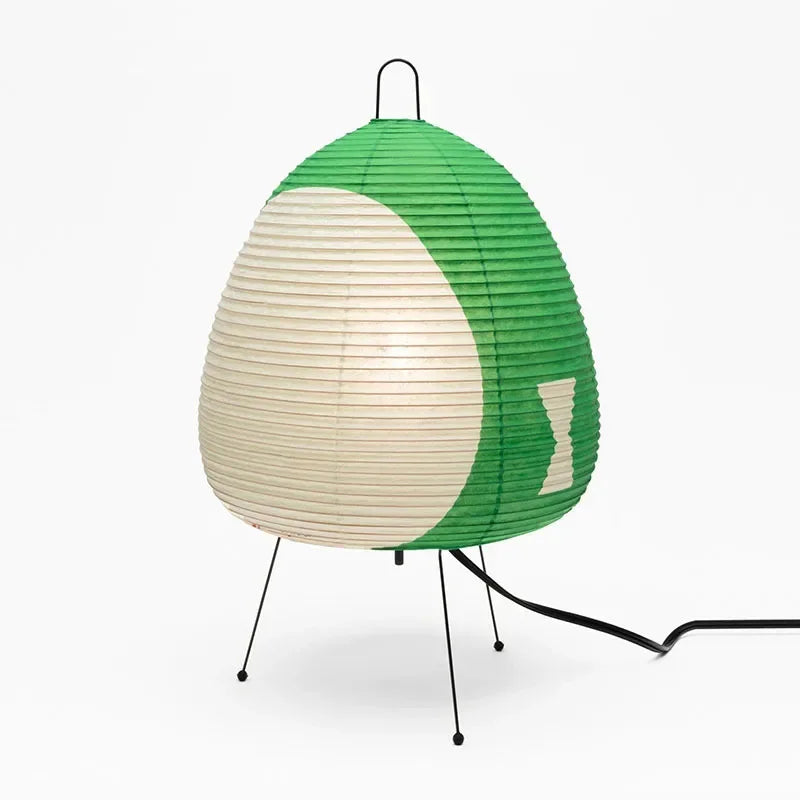 Modern lamp with green and white design on a white background