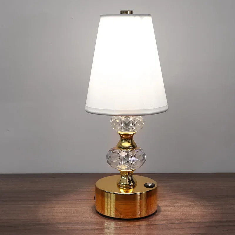 Gold crystal-style table lamp with white fabric shade, 29.5cm