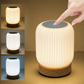 Dimmable portable table lamp showing adjustable brightness levels in a warm ambient setting