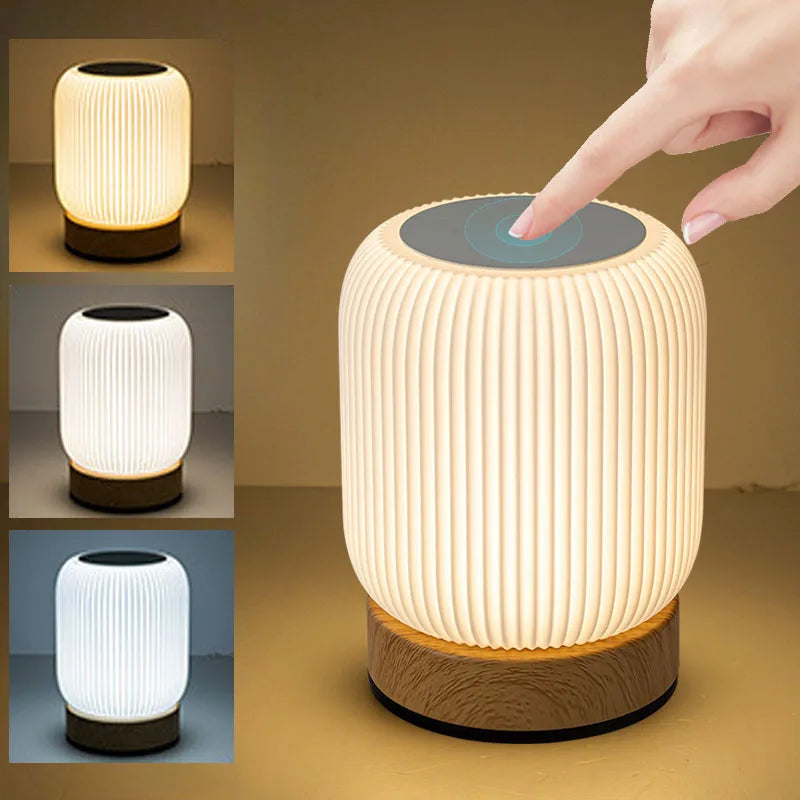 Dimmable portable table lamp showing adjustable brightness levels in a warm ambient setting
