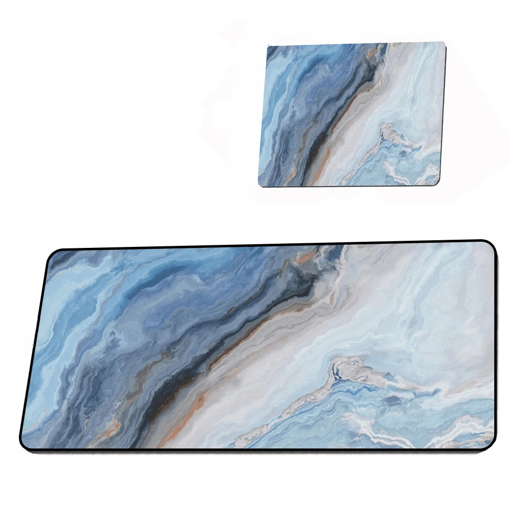 Two rectangular mats with a blue and gray marbled pattern on a white background