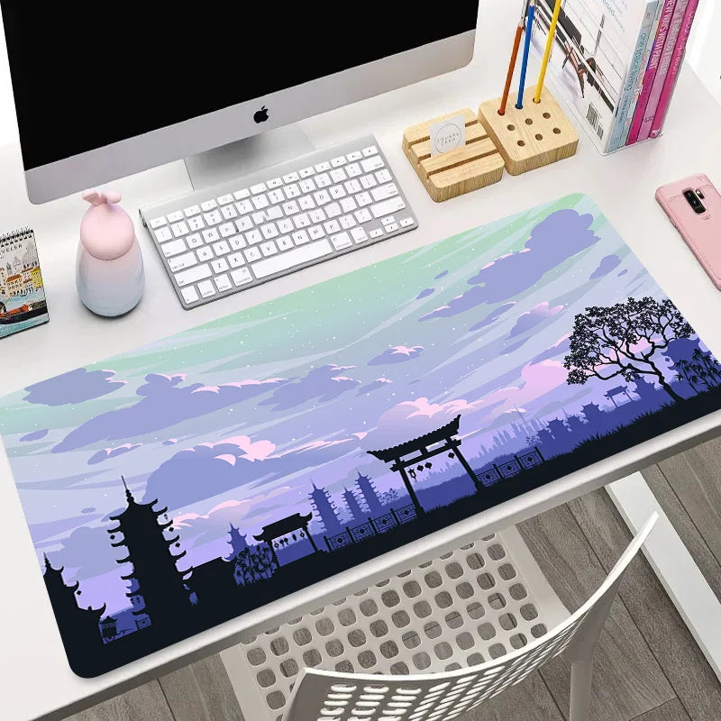 Extended mouse pad with purple twilight temple silhouette and starry sky, shown flat and rolled
