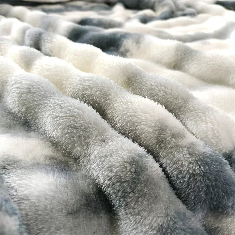 Close-up of textured grey and white Polyester blanket