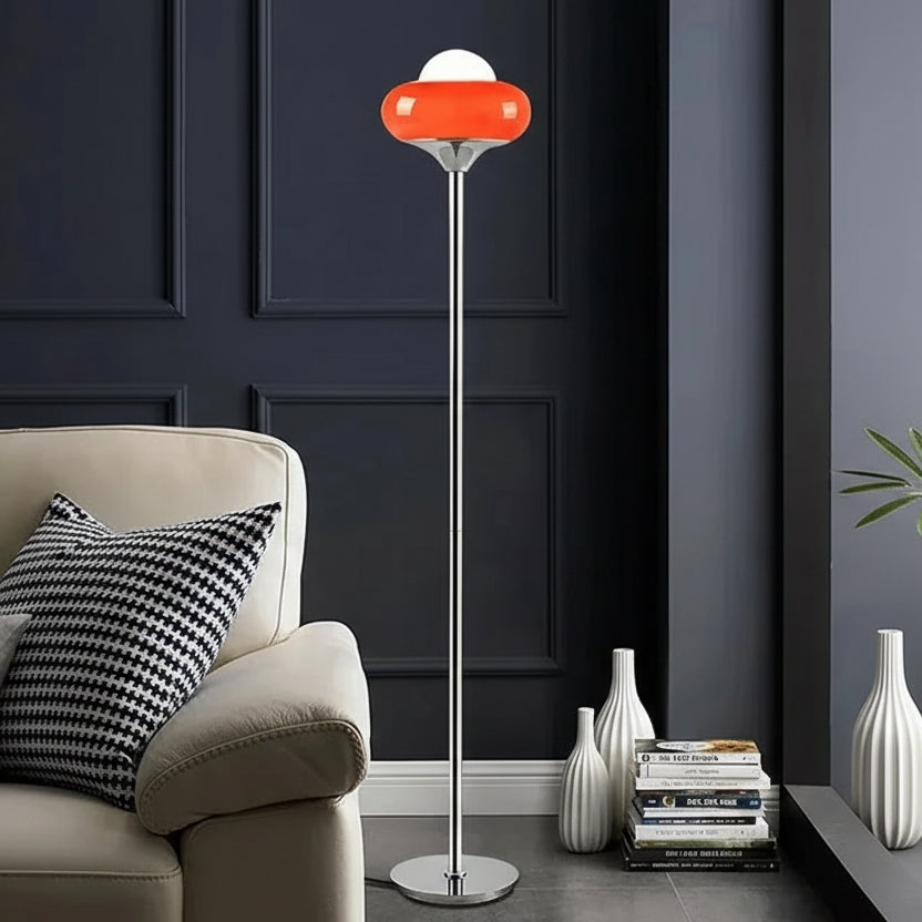 Floor lamp with dimensions displayed next to a sofa and decorative items.