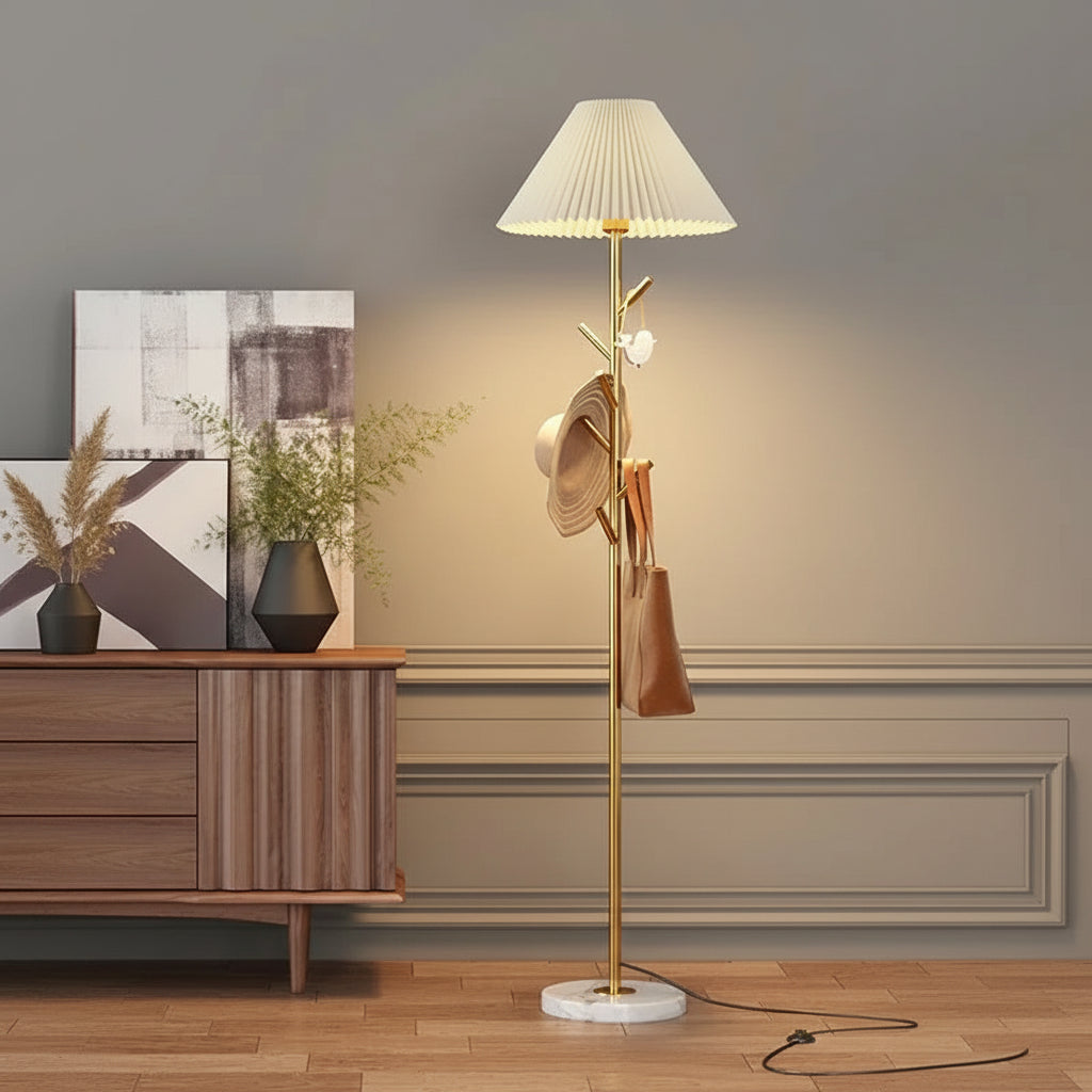 Gold metal floor lamp with marble base and integrated hooks