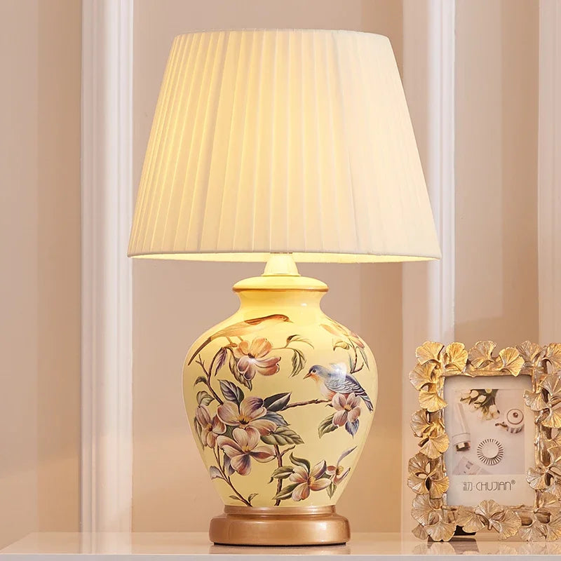 Decorative table lamp with floral design on a beige background