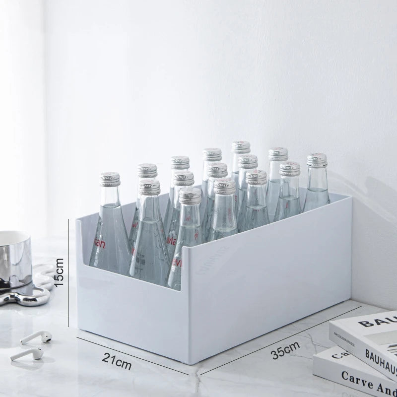 White storage box with bottles on a white background