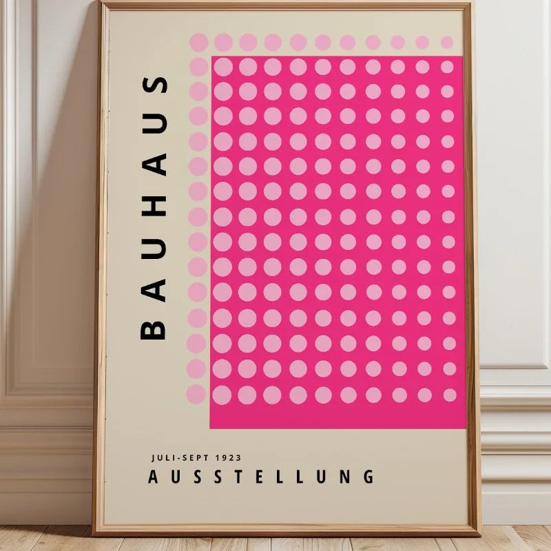 Bauhaus dot pattern wall art with bright pink and pale pink circular grid on a cream background