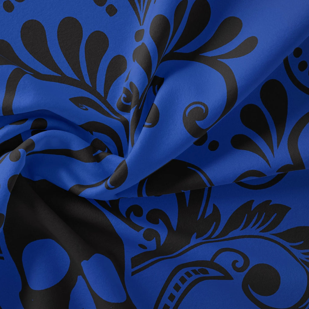 Cobalt blue skull print duvet cover close-up.