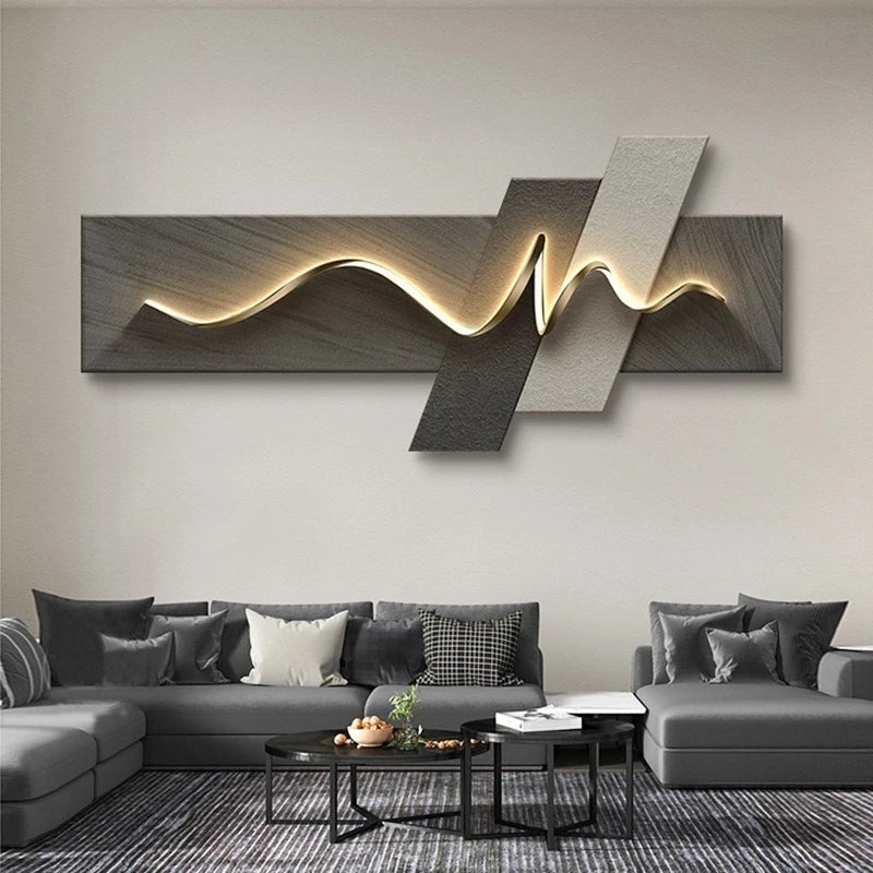 Modern living room with a large abstract wall light sculpture and a grey sectional sofa.
