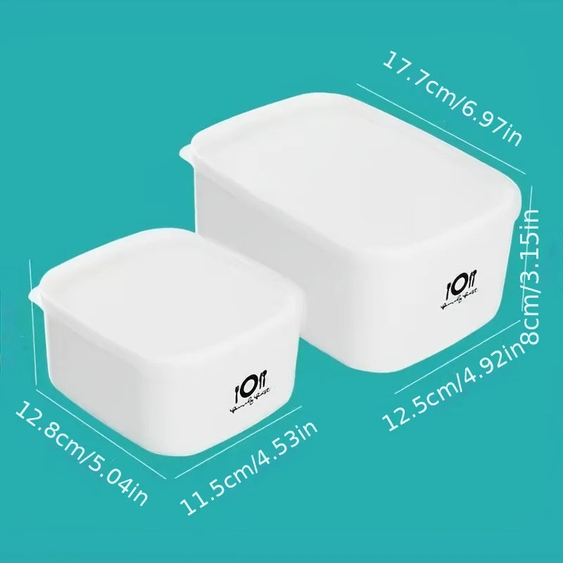 Two white containers with measurement details on a teal background