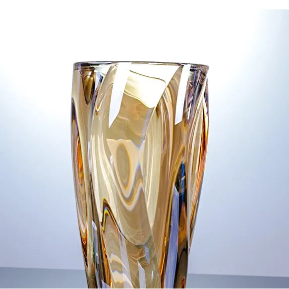 Sunset amber crystal glass vase featuring a rich golden gradient and spiralled texture.