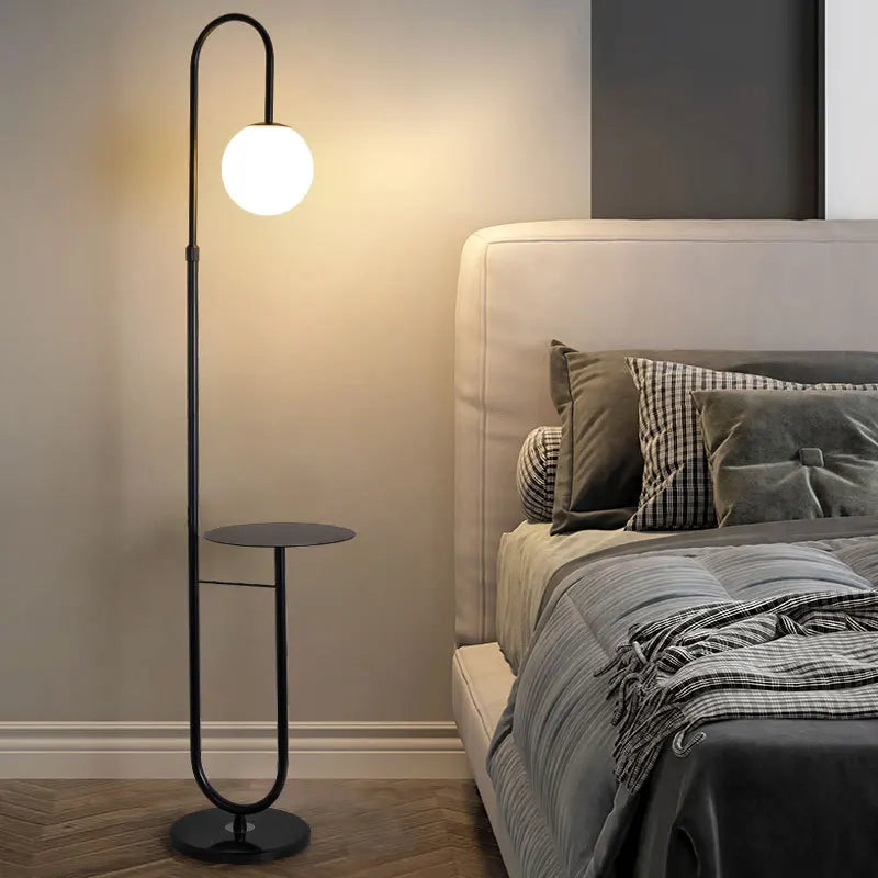 Black Nordic floor lamp with integrated round side table