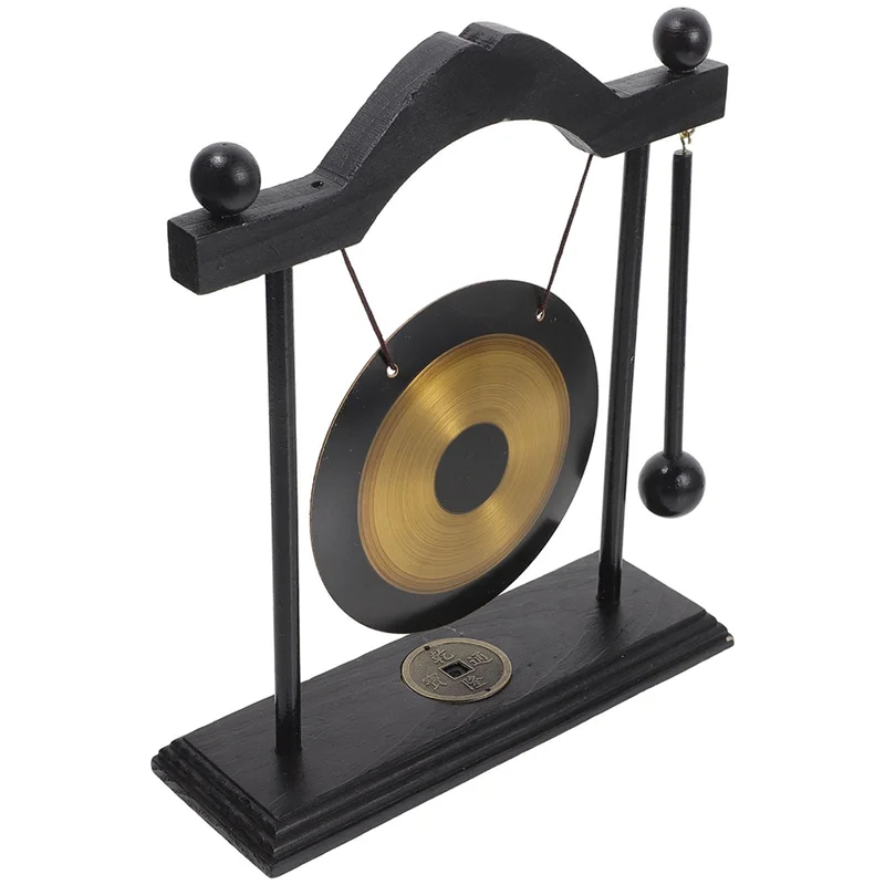 Decorative gong on a stand with a white background