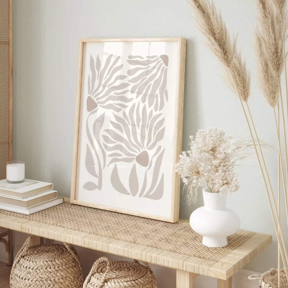 Neutral abstract botanical leaf cotton canvas print styled beside a white vase and pampas grass