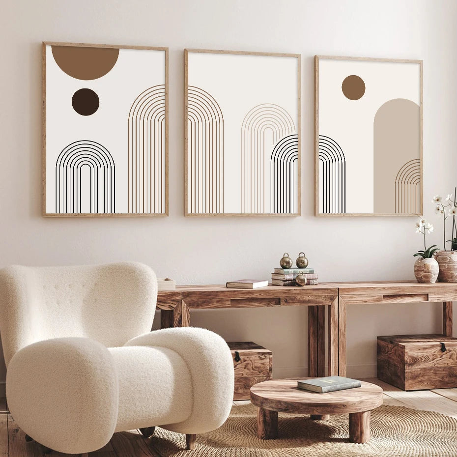 Modern interior with abstract wall art, wooden furniture, and a beige armchair.