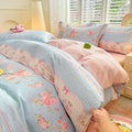 Blue Gingham cotton duvet cover with decorative pink bows and floral vine details.