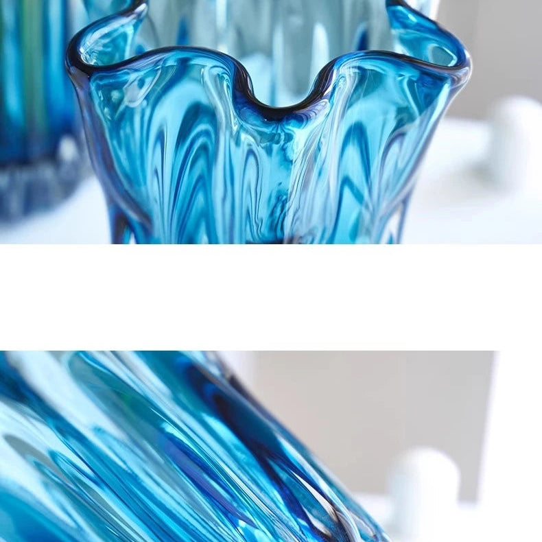 Close-up of blue ripple glass vase rim detail