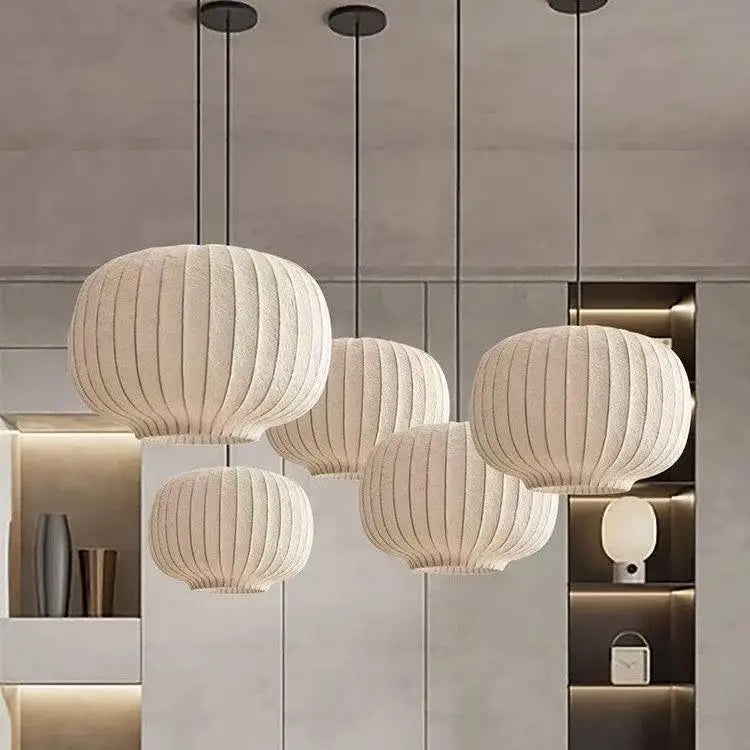 Set of pendant lights hanging in a modern interior setting