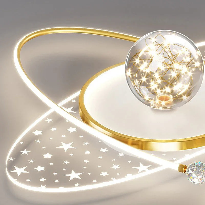 Gold elliptical planet LED ceiling light with gold frame, crystal ball and star panels, 60×60cm