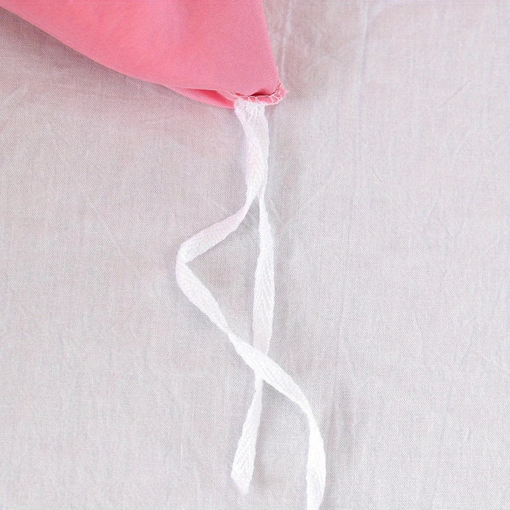 Detail view of soft Polyester fabric with raised stitching