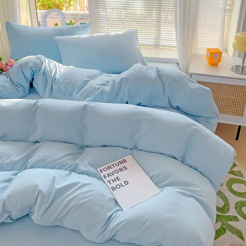 Sky blue cotton 4-piece bedding set with soft, breathable texture