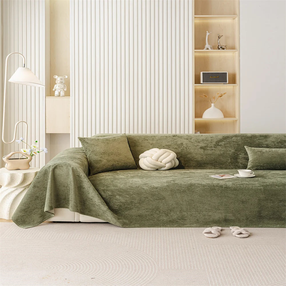 Olive Polyester sofa throw covering a full sofa with a modern decor setting