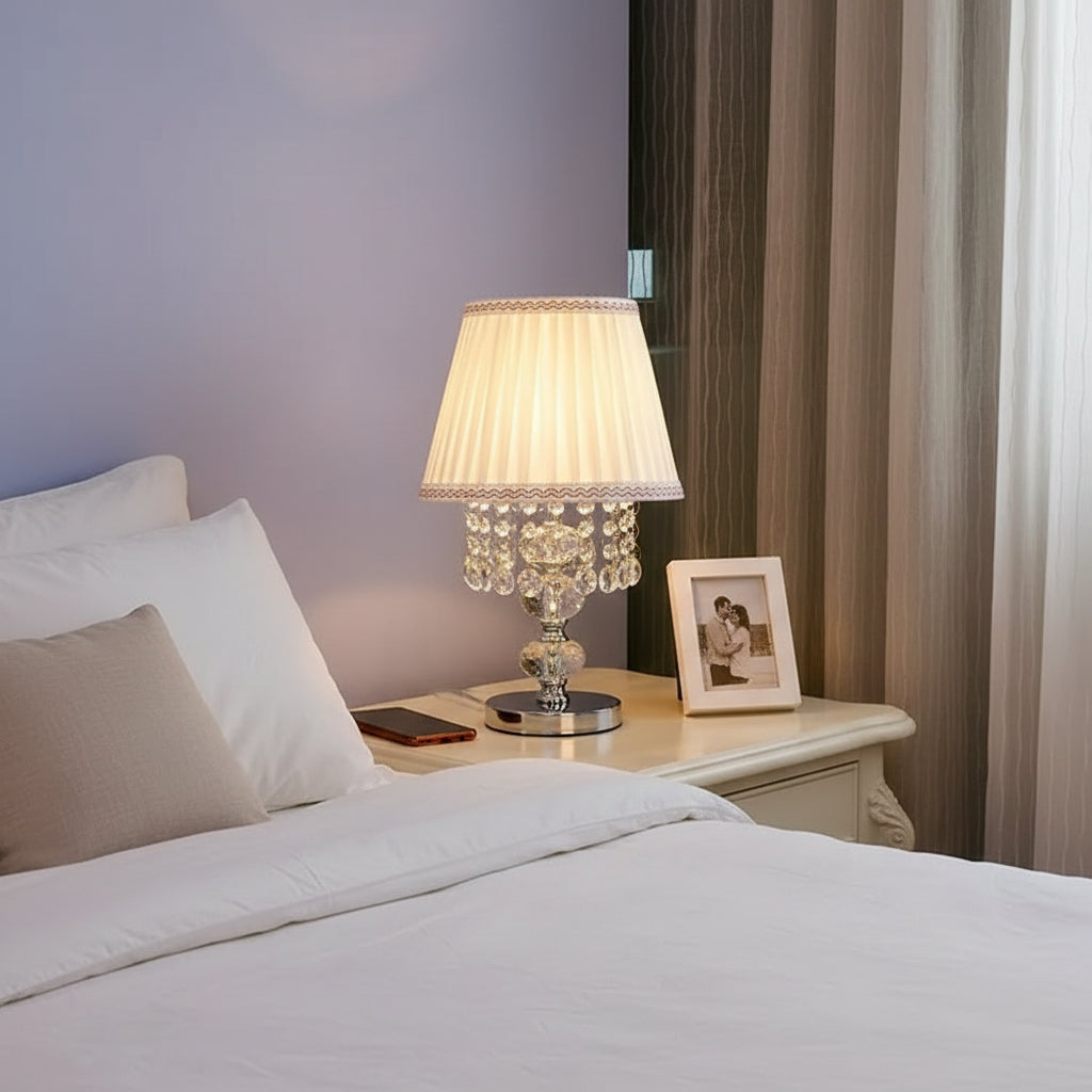 Elegant crystal pendant style lamp with a cream pleated fabric shade and hanging crystal accents.