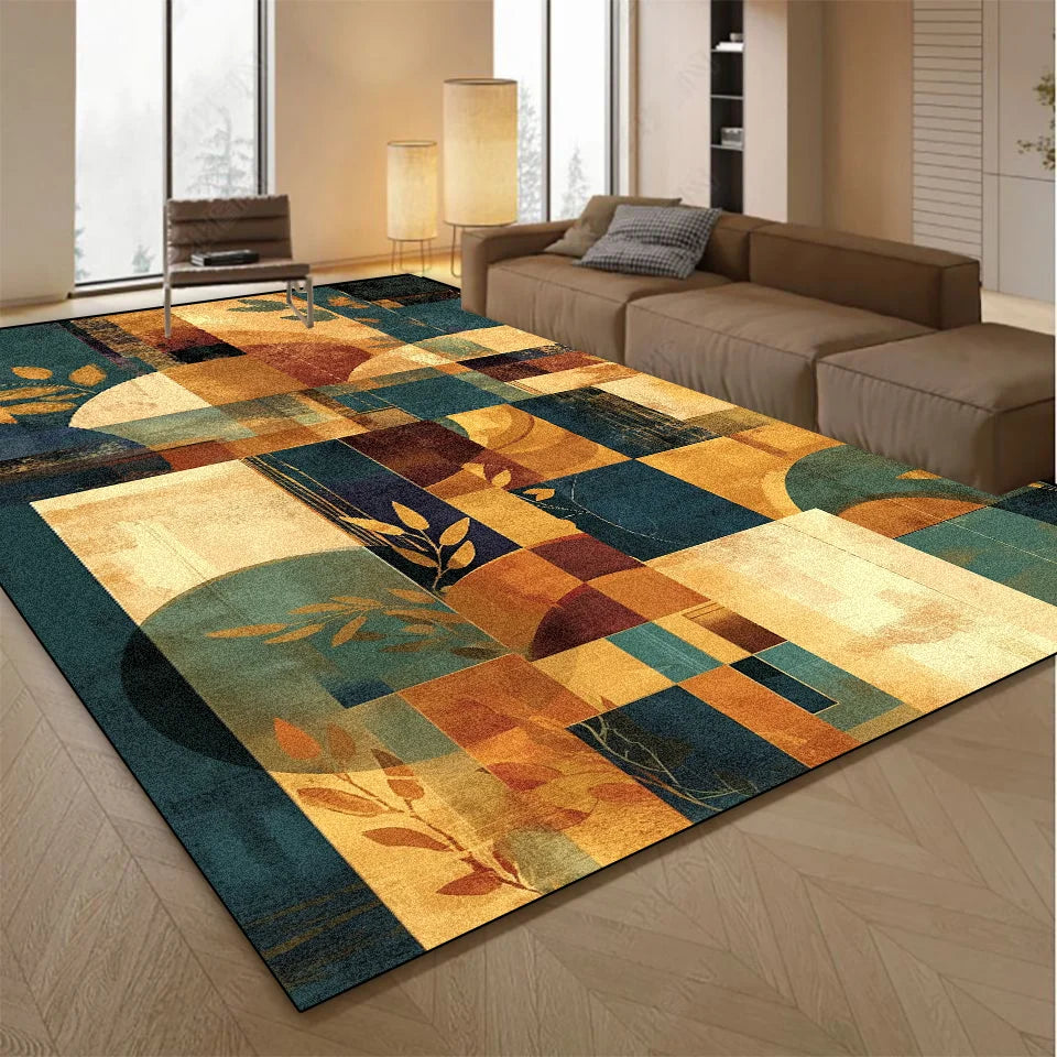 Abstract printed flannel rug with botanical leaf details, geometric patchwork blocks, and warm teal, gold, cream, and rust tones in a modern living room.