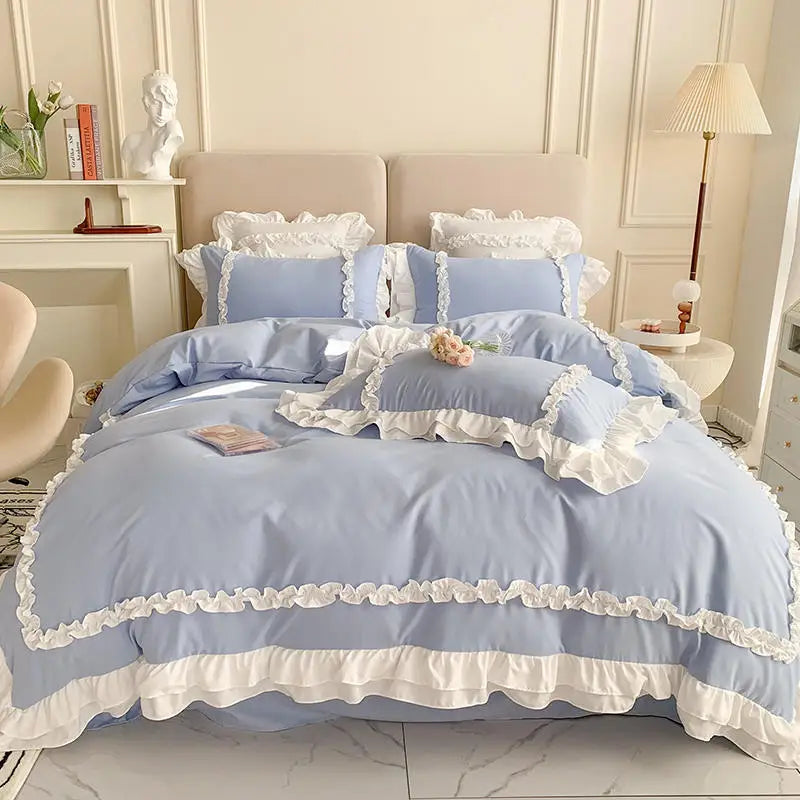 (Sky Blue): Sky blue ruffle bedding set with layered white trim on a made-up bed