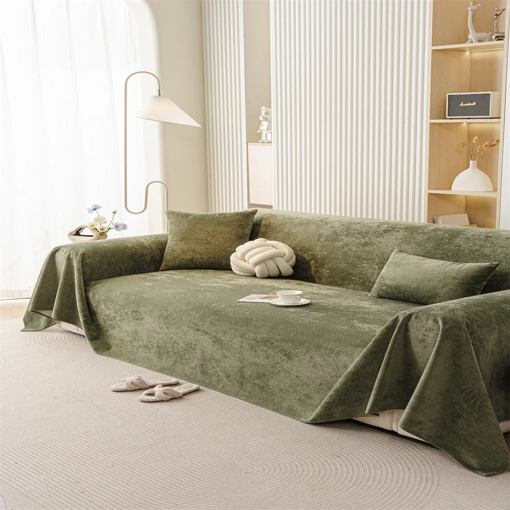 Olive Polyester sofa throw covering a full sofa with a modern decor setting