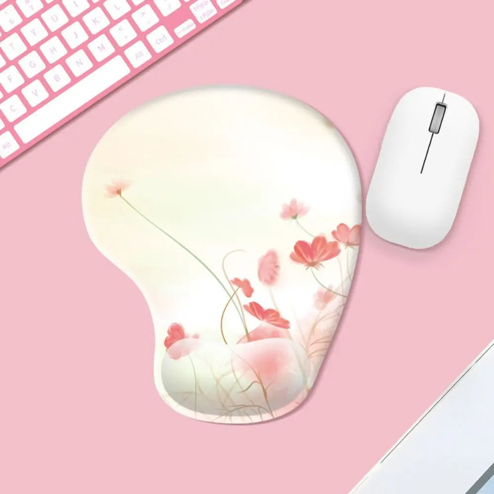 Floral mouse pad with a white mouse on a pink surface