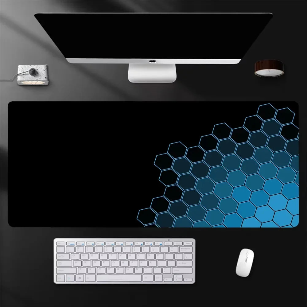 Black gaming desk mat with blue fading hexagon pattern