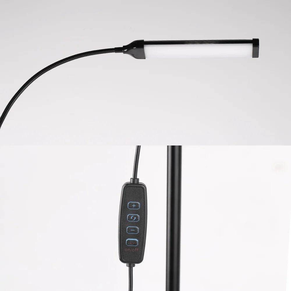 Black adjustable desk lamp with remote control on a white background