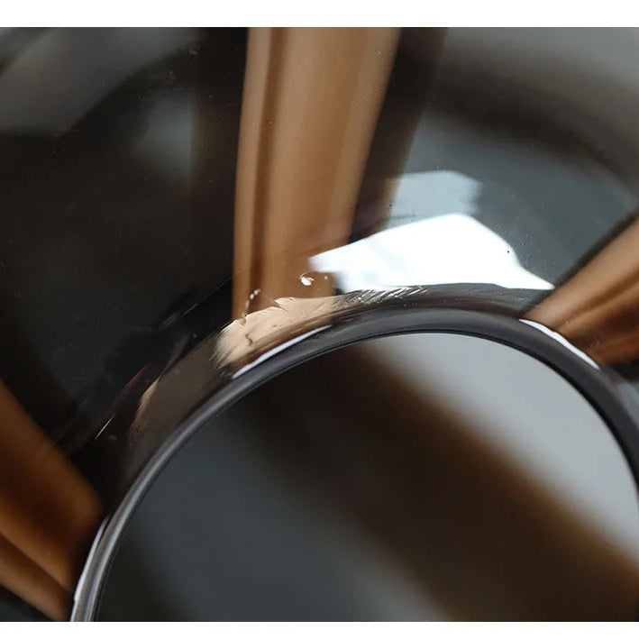 Close-up of high-gloss artistic glass swirl detail